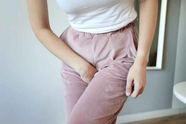 woman running for the toilet because of urinary incontinence Banbury